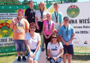 Grupowe zdjęcie reprezentacji naszego ośrodka na podium